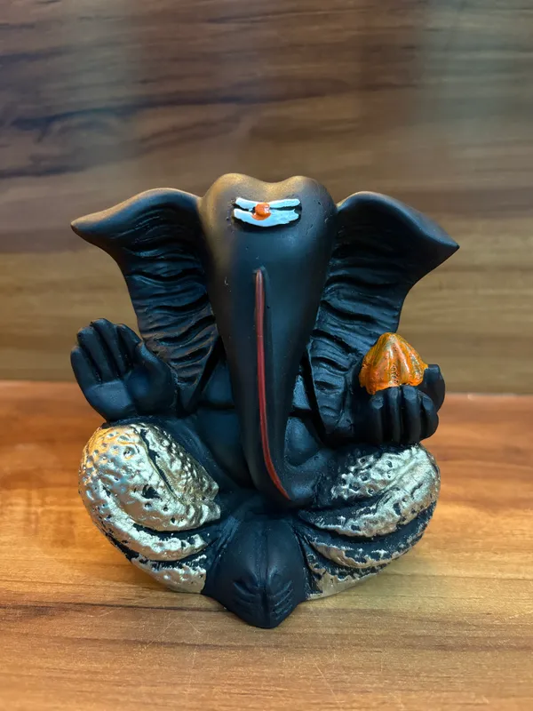 Set_of_4_Black_Ganesha_Idols_–_Decorative_Sitting_Ganesh_Figurines_for_Home_&_Office