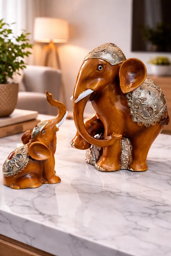 Elegant_Decorative_Elephant_Figurine_Set_–_Golden_Carved_Mother_&_Baby_Elephant_Statue_for_Home_&_Office_Décor