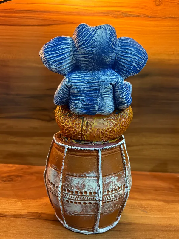 Handcrafted_Blue_Lord_Ganesha_Idol_Sitting_on_Traditional_Drum_12_inch_x_6_inch_–_Spiritual_Home_Décor_Showpiece