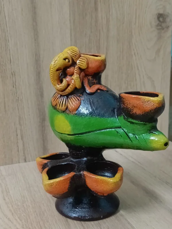 Handmade_yellow_terracotta_diya_�??_elegant,_eco-friendly_oil_lamp_for_Diwali,_puja,_weddings_&_home_décor