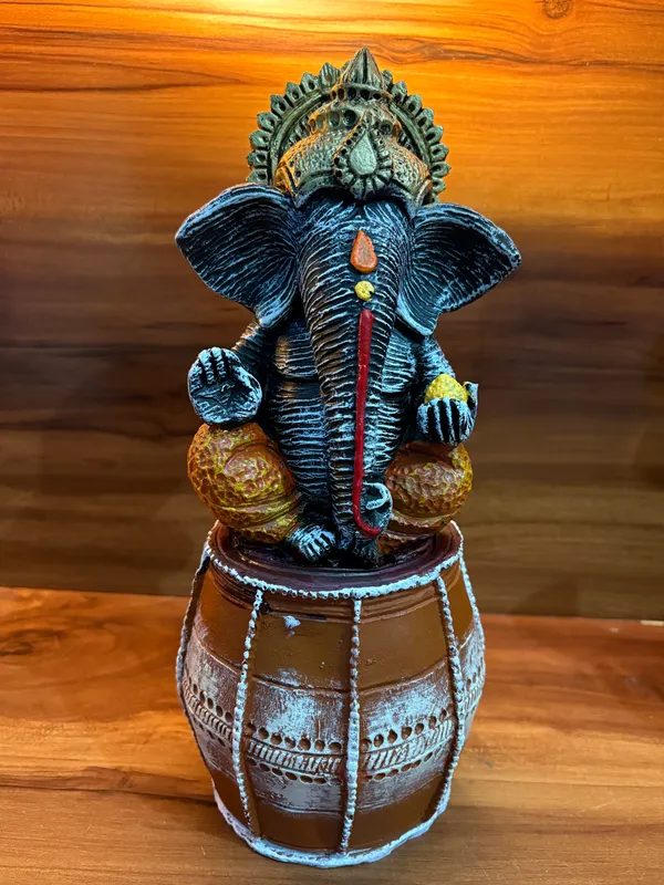 Handcrafted_Lord_Ganesha_Idol_Sitting_on_Dholak_12_inch_x_6_inch_–_Decorative_Resin_Statue_for_Home_&_Office