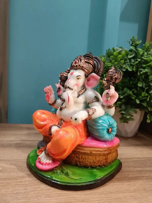 Handcrafted_Lord_Ganesha_Idol_(8''x6'')�??Marble_Resin_Statue_for_Home_Décor,_Puja_&_Gifting_(Multicolor)