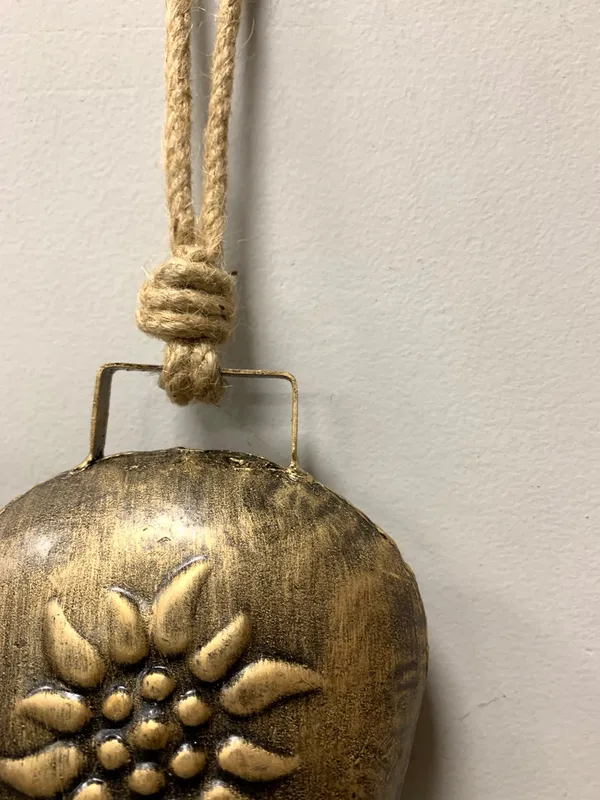 Decorative_Metal_Hanging_Bell_with_Floral_Design,_Jute_Rope_for_Home,_Door_Hanging,_Wall_Décor_&_Festive_Gifts_(10x4.5_inches)