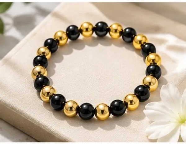 Golden_Hematite_and_Black_Beaded_Healing_Bracelet_-_Root_Chakra_Balance,_Grounding_Energy,_and_Protection_Stretch_Wristband_for_Men_and_Women