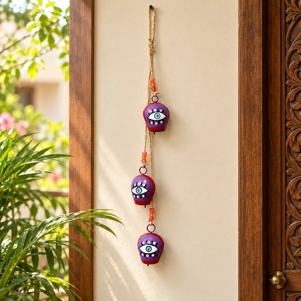 Metal_Evil_Eye_Wind_Chime_with_3_Decorative_Bells_with_Colourful_Beads_&_Jute_Rope_for_Home_Entrance,_Balcony_Décor_&_Gifting_(26_inch)