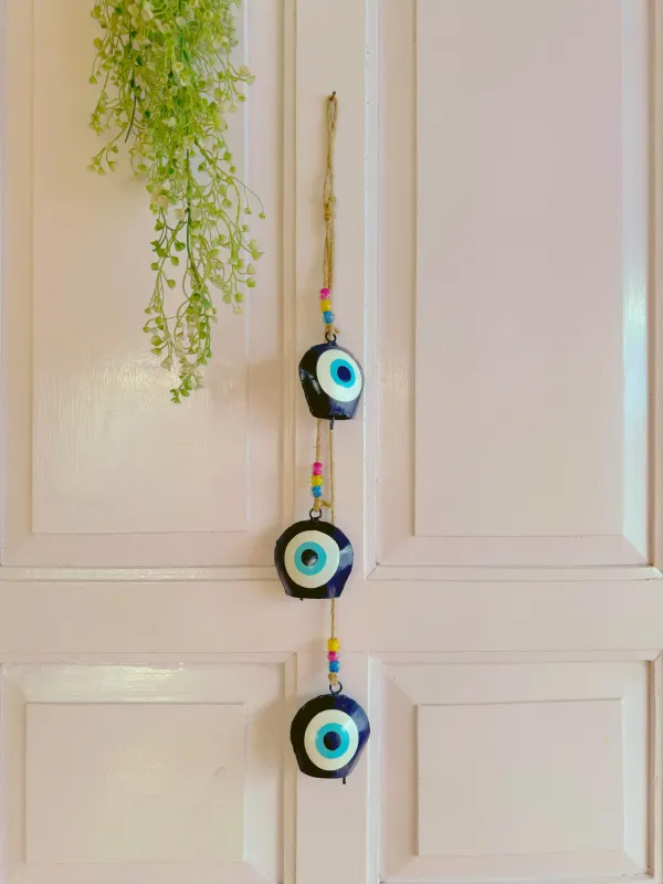Metal_Wall_Hanging_Windchime_with_Evil_Eye_design_Hanging_CowBells