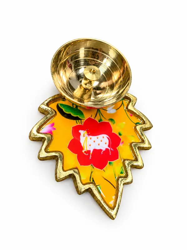 Pack_of_2_Decorative_Metal_Leaf_Shaped_Diyas_with_Golden_Finish_&_Colourful_Floral_Cow_Design_|_Traditional_Pooja_Oil_Lamps_for_Diwali,_Home_Temple,_Festive_Decoration,_Housewarming_&_Return_Gifts