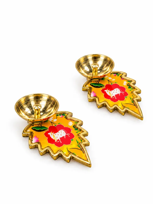 Pack_of_2_Decorative_Metal_Leaf_Shaped_Diyas_with_Golden_Finish_&_Colourful_Floral_Cow_Design_|_Traditional_Pooja_Oil_Lamps_for_Diwali,_Home_Temple,_Festive_Decoration,_Housewarming_&_Return_Gifts
