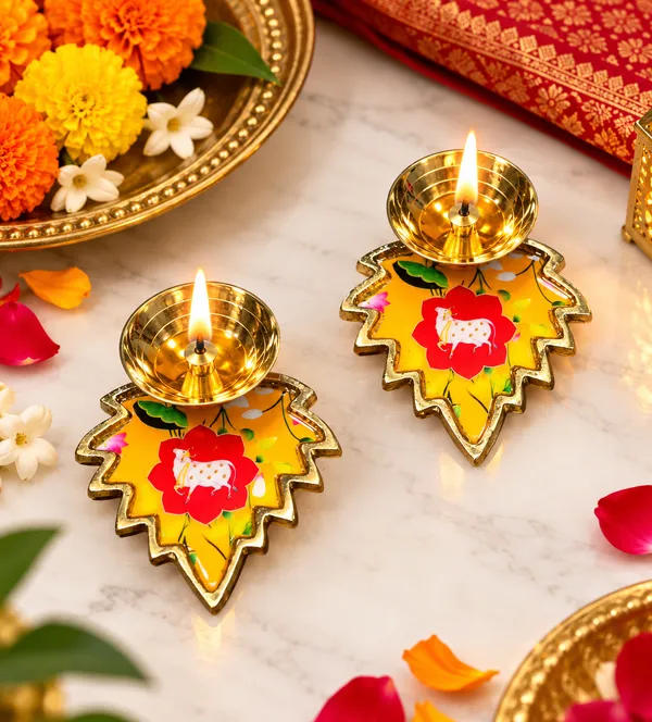 Pack_of_2_Decorative_Metal_Leaf_Shaped_Diyas_with_Golden_Finish_&_Colourful_Floral_Cow_Design_|_Traditional_Pooja_Oil_Lamps_for_Diwali,_Home_Temple,_Festive_Decoration,_Housewarming_&_Return_Gifts