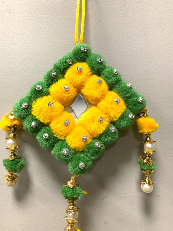 Pack_of_2_Handmade_Green_&_Yellow_Pompom_Wall_Hanging_for_Diwali_&_Festive_Home_Décor_(_12x4.5_inches)