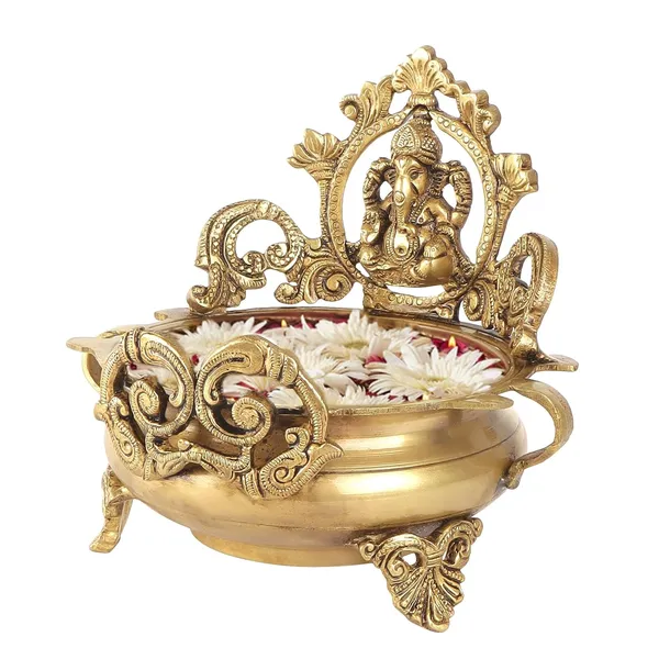 Pure_Brass_Decorative_Urli_with_Lord_Ganesha_Idol_Traditional_Pooja_Bowl_for_Home_D?cor,_Mandir_&_Festivals_|_Handcrafted_Brass_Urli_Showpiece_6_Inches,Urli_for_Flower_Decoration,_Bowls_for_Pooja