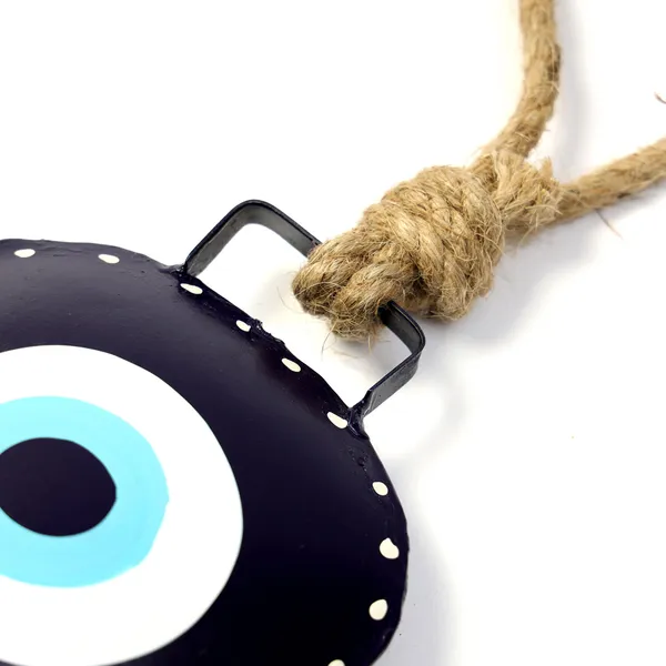 Metal_Wall_Hanging_Swiss_EvilEye_CowBell_Hanging_with_the_Floral_Design
