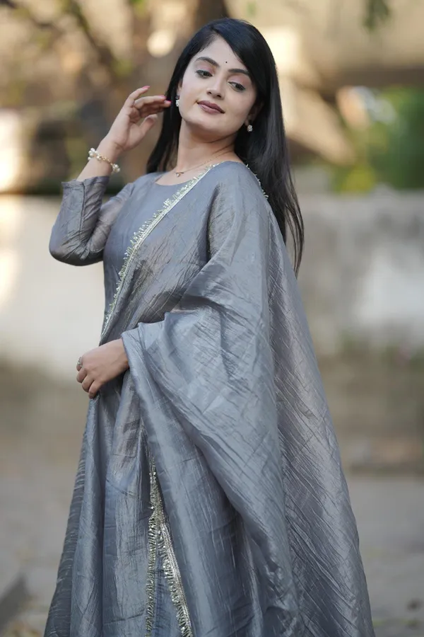 Grey_Flowy_Gown_For_All_Occasion_With_Gold_Crush_Fabric_Gray_Colour_Very_Popura_Design_For_Women