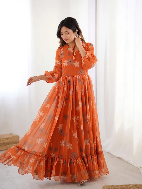 Orange_Ethereal_Clouds_Flared_Gown_Cum_One_Piece_For_Ladies_Made_For_All_Season_With_Faux_Georgette_Fabric_All_Over_Floral_Printed_With_Double_Frill_Patterns_For_Women