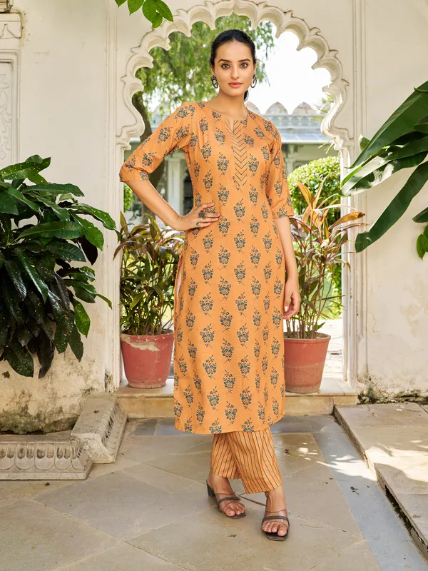 Mustard_Cotton_Blend_Straight_Calf_Length_Keyhole_Neck_Kurta_Sets_For_Women