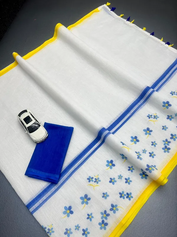BEAUTIFUL_Yellow_Colour_Border_With_Blue_Colour_Flower_Design__Premium_Saree