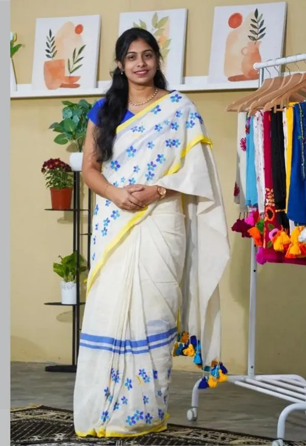 BEAUTIFUL_Yellow_Colour_Border_With_Blue_Colour_Flower_Design__Premium_Saree