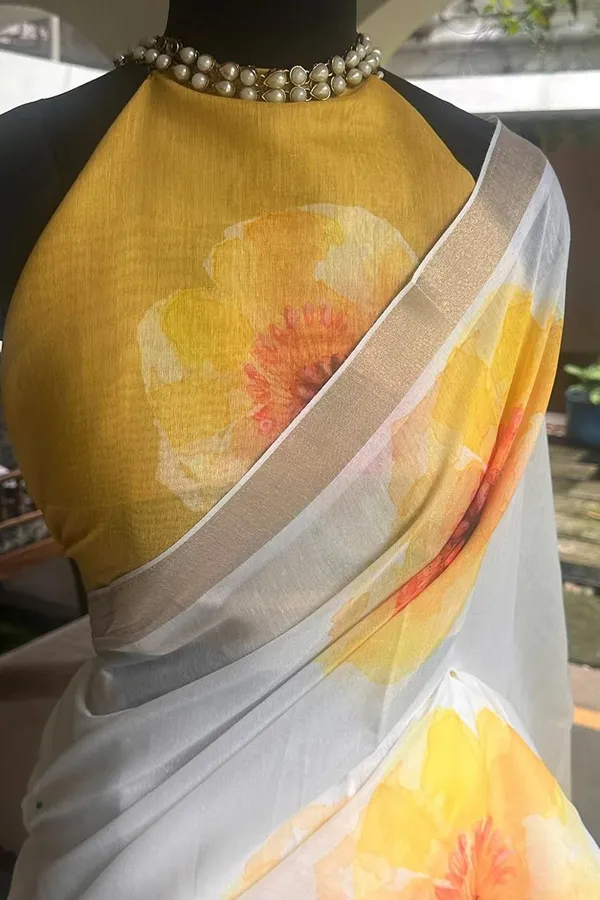 WHITE_&_ORANGE_FLOWER_LINEN_SAREES