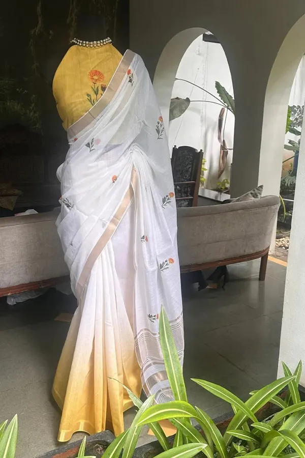 WHITE_&_ORANGE_FLOWER_LINEN_SAREES