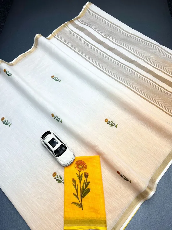 WHITE_&_ORANGE_FLOWER_LINEN_SAREES