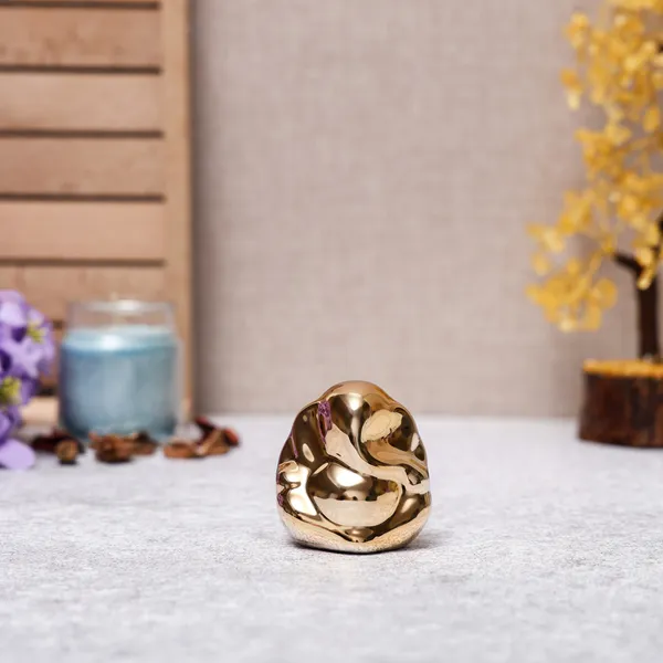 Golden_Ganpati_Idol_|_Perfect_for_Car_Dashboard_|_Ideal_for_Home_Temple_&_Office_Decor_|_Best_Gift_for_Blessings_and_Positive_Energy_(5.5cm)