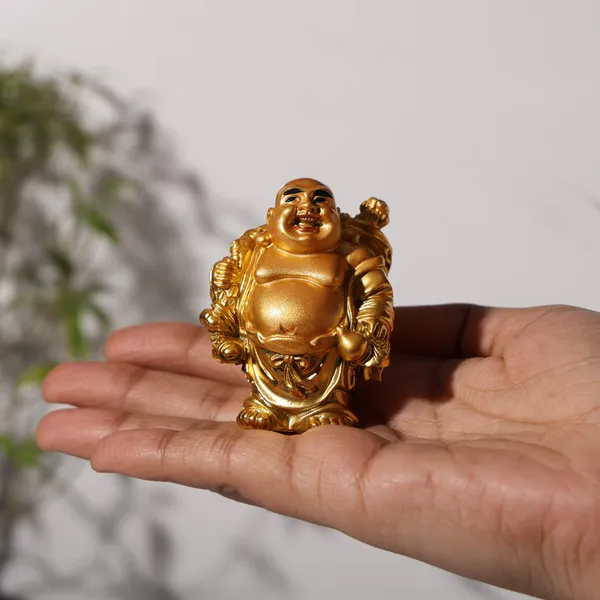 Golden_Laughing_Buddha_Holding_Wealth_Bag_for_Fortune_|_Money_&_Good_Luck_7_CM