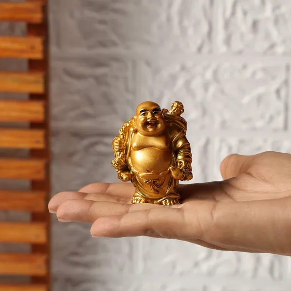 Golden_Laughing_Buddha_Holding_Wealth_Bag_for_Fortune_|_Money_&_Good_Luck_7_CM