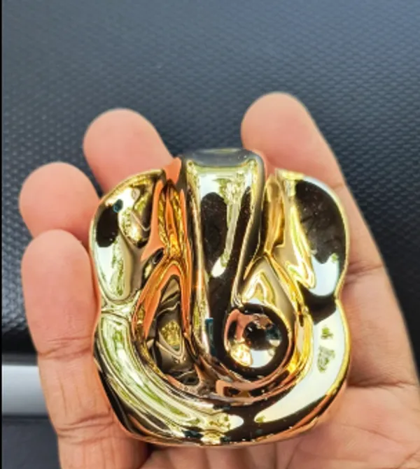 Golden_Ceremic_Ganesh_Idol_For_Car_Dashboard_|_Home_Decor_|_Gifting_&_Prosperity__-__6_Cm