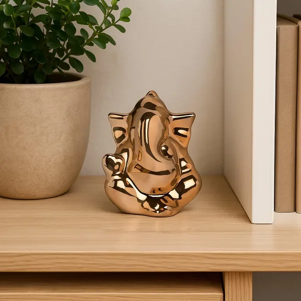 Ganesh_Idol_for_Home_Decor_&_Car_Dashboard_|_Ganesh_Ji_Murti_Decorative_Showpiece_for_Home_Decor_|_Pooja_Room_&_Office_Desk_(Golden)_10_CM