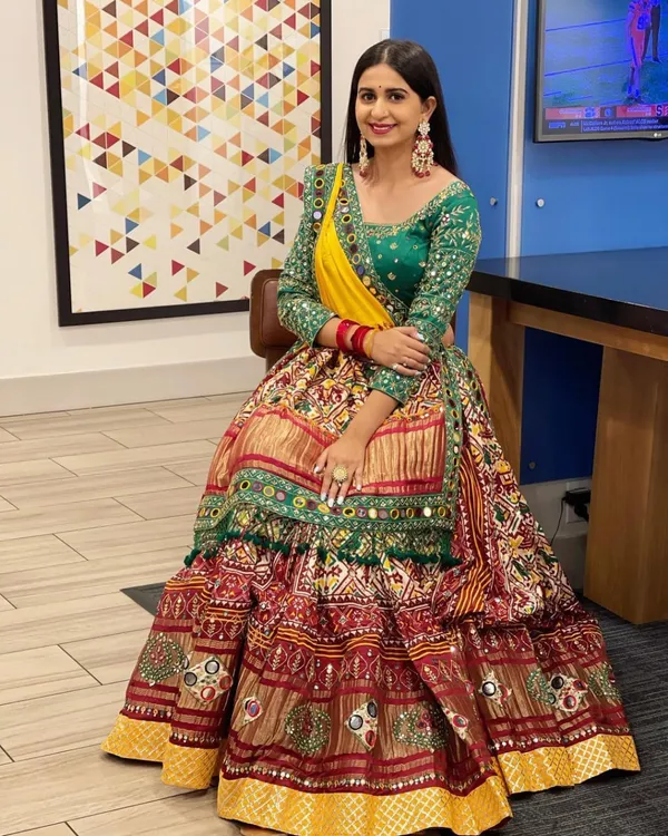 Choli_And_Lehenga_Red_Green_Butter_Silk_Fabric_Dola_Silk_Lehenga_Choli_With_Mirror_Work_And_Attached_Yellow_Dupatta