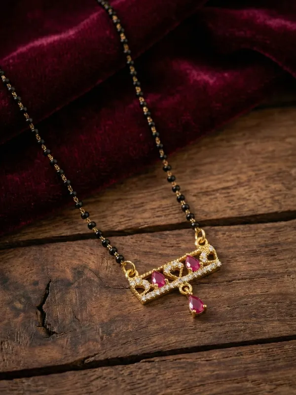 Elegant_Gold-Plated_Mangalsutra_with_Ruby-Coloured_AD_Stones