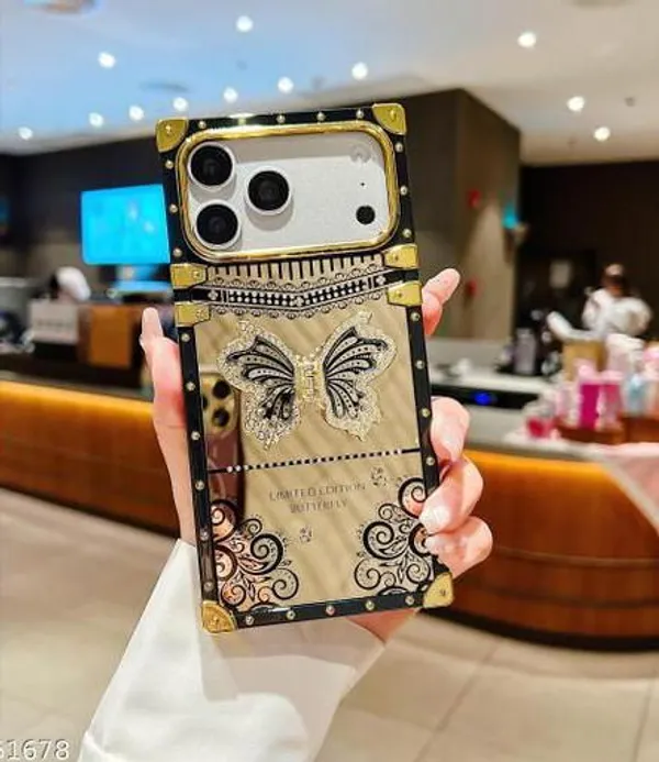 NEW_DESIGN_LADlES_OG_BUTTERFLY_WITH_DAIMAND_CASE_WITH_BLACK_OUTLINES_ON_IT