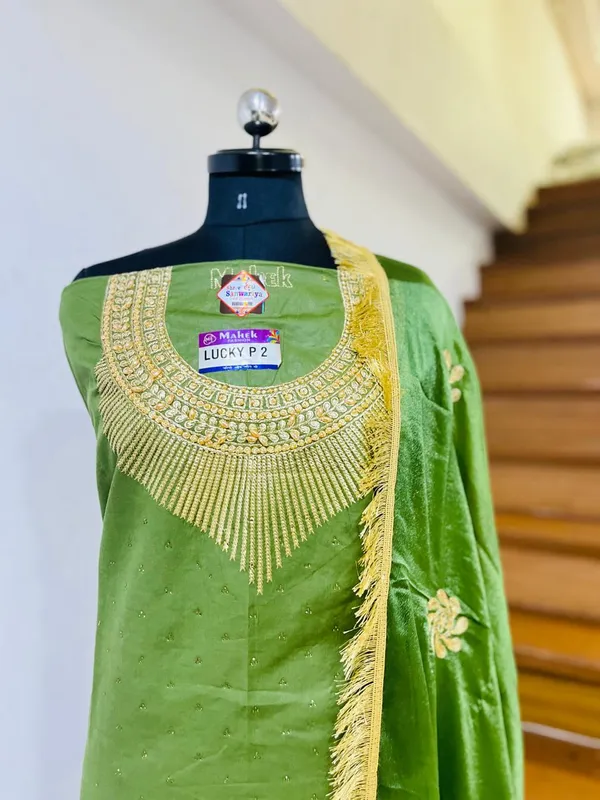 Green_Cotton_Embroidery_Unstitched_Suit_For_Women