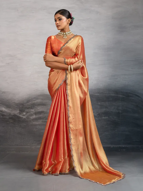 Peach-Orange_Burberry_Chiffon_Saree_with_Zarkan_&_Cutdana_Appliqu�_Lace_Work