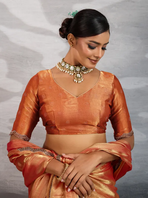 Peach-Orange_Burberry_Chiffon_Saree_with_Zarkan_&_Cutdana_Appliqu�_Lace_Work