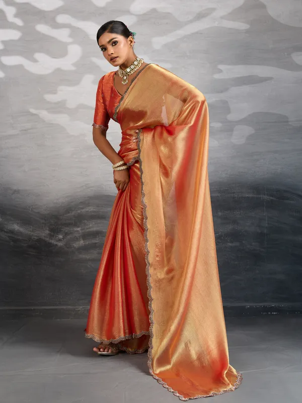 Peach-Orange_Burberry_Chiffon_Saree_with_Zarkan_&_Cutdana_Appliqu�_Lace_Work