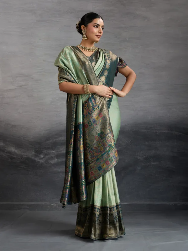 Mint_Green_&_Navy_Blue_Kanjivaram_Silk_Saree_with_Antique_Zari_Border