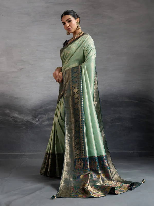 Mint_Green_&_Navy_Blue_Kanjivaram_Silk_Saree_with_Antique_Zari_Border