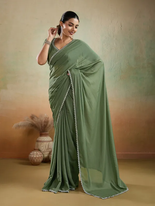 Sage_Green_Matt_Georgette_Saree_With_Ceramic-Inspired_Lace_Detailing_For_Women