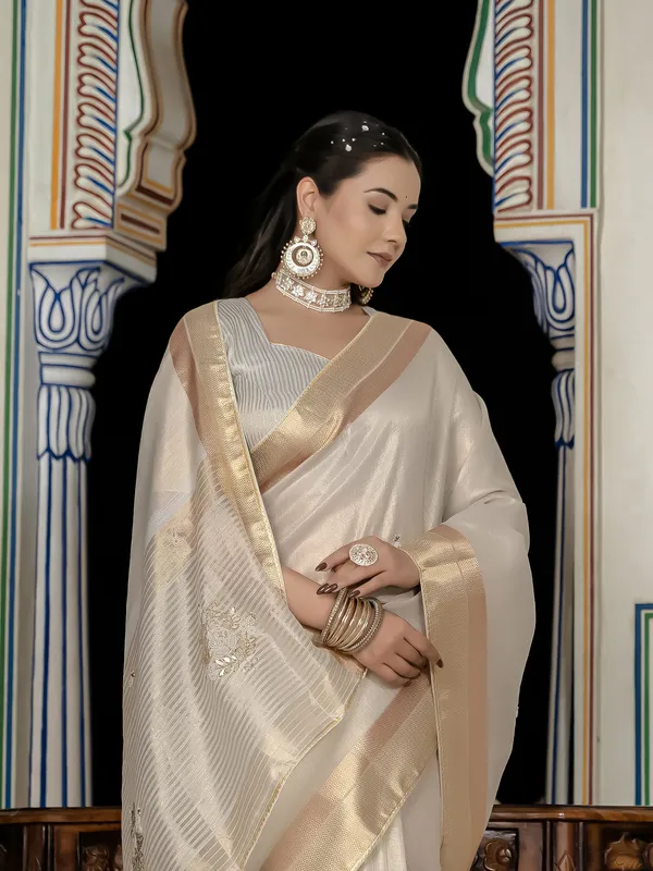 Off-White_Tissue_Linen_Saree_With_Golden_Zari_&_Khatli_Embroidery_For_Women