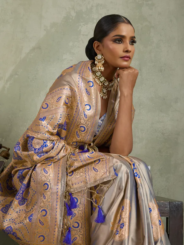Champagne_Beige_&_Royal_Blue_Satin_Silk_Banarasi_Saree_with_Antique_Gold_Meenakari_Zari_Weaving