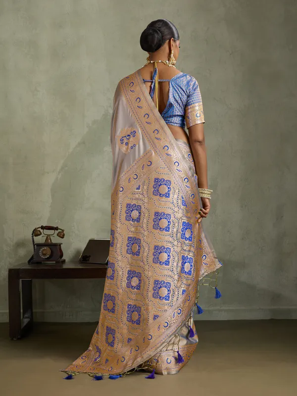 Champagne_Beige_&_Royal_Blue_Satin_Silk_Banarasi_Saree_with_Antique_Gold_Meenakari_Zari_Weaving