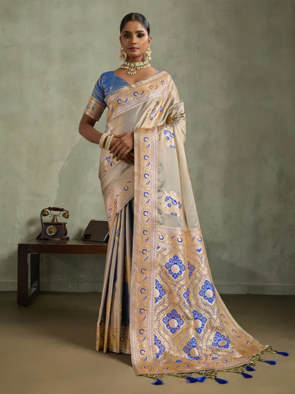 Champagne_Beige_&_Royal_Blue_Satin_Silk_Banarasi_Saree_with_Antique_Gold_Meenakari_Zari_Weaving