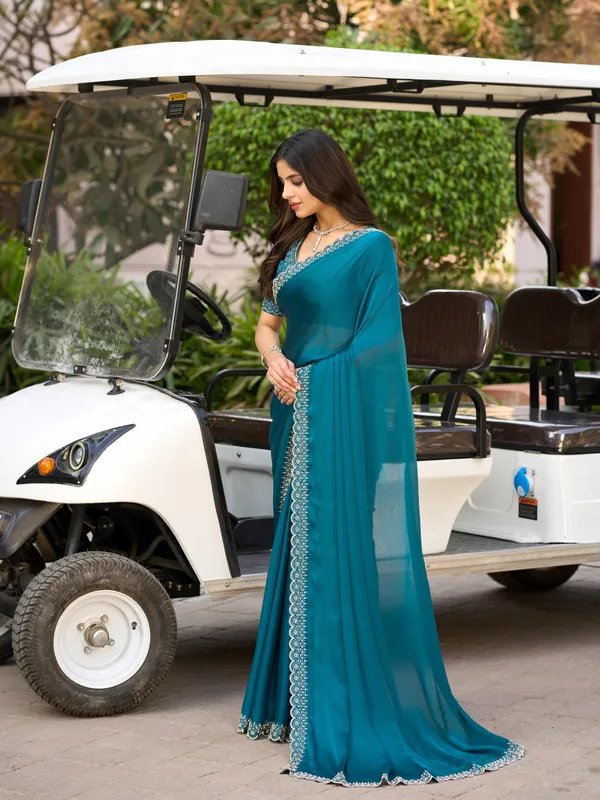 Ocean_Teal_Blue_Satin_Chiffon_Saree_with_Elegant_Embroidered_Detailing