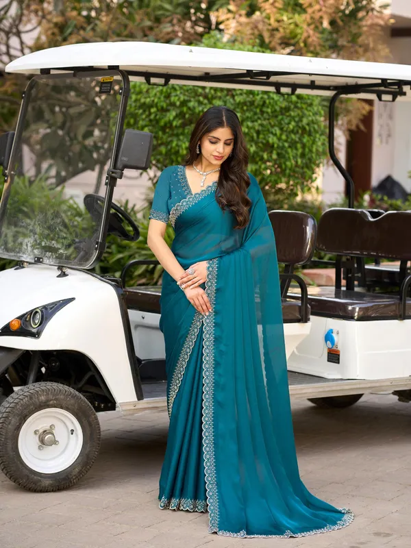 Ocean_Teal_Blue_Satin_Chiffon_Saree_with_Elegant_Embroidered_Detailing