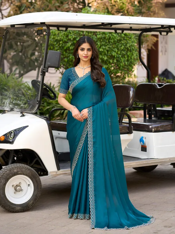Ocean_Teal_Blue_Satin_Chiffon_Saree_with_Elegant_Embroidered_Detailing