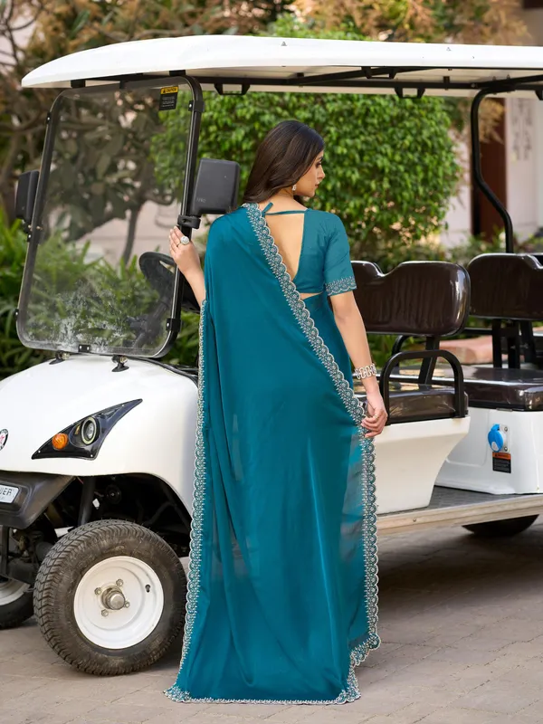 Ocean_Teal_Blue_Satin_Chiffon_Saree_with_Elegant_Embroidered_Detailing