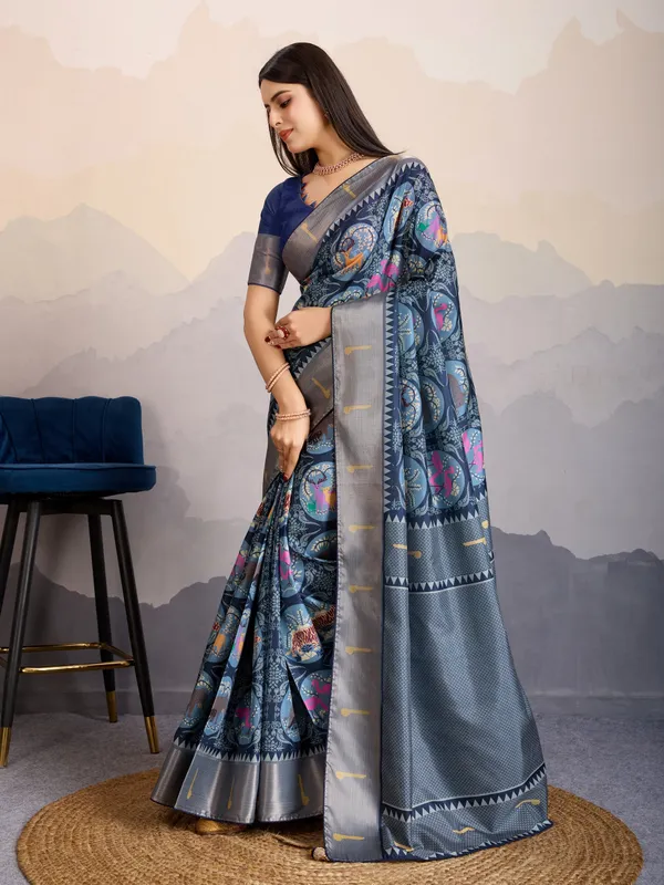 Elegant_Steel_Blue_Mriga_Patolsi_Dola_Satin_With_3D_Fauna_Print,_Zari_Patta_&_Designer_Tassels_Saree_For_Women