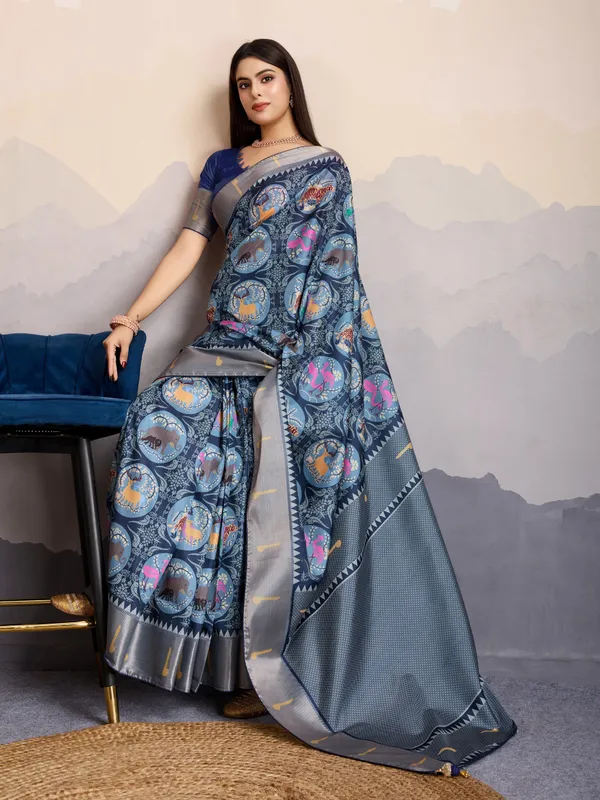 Elegant_Steel_Blue_Mriga_Patolsi_Dola_Satin_With_3D_Fauna_Print,_Zari_Patta_&_Designer_Tassels_Saree_For_Women