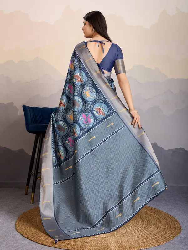 Elegant_Steel_Blue_Mriga_Patolsi_Dola_Satin_With_3D_Fauna_Print,_Zari_Patta_&_Designer_Tassels_Saree_For_Women